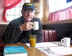 Neil Peart sipping coffee in Littleton, New Hampshire