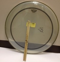 Neil Peart drumhead and sticks: Music For Newtown auction