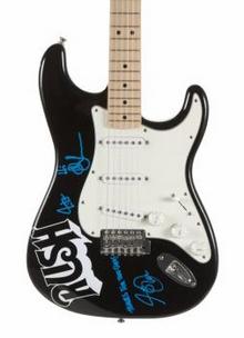 Guitar signed by Rush - Julien's Music Icons 2013 Auction